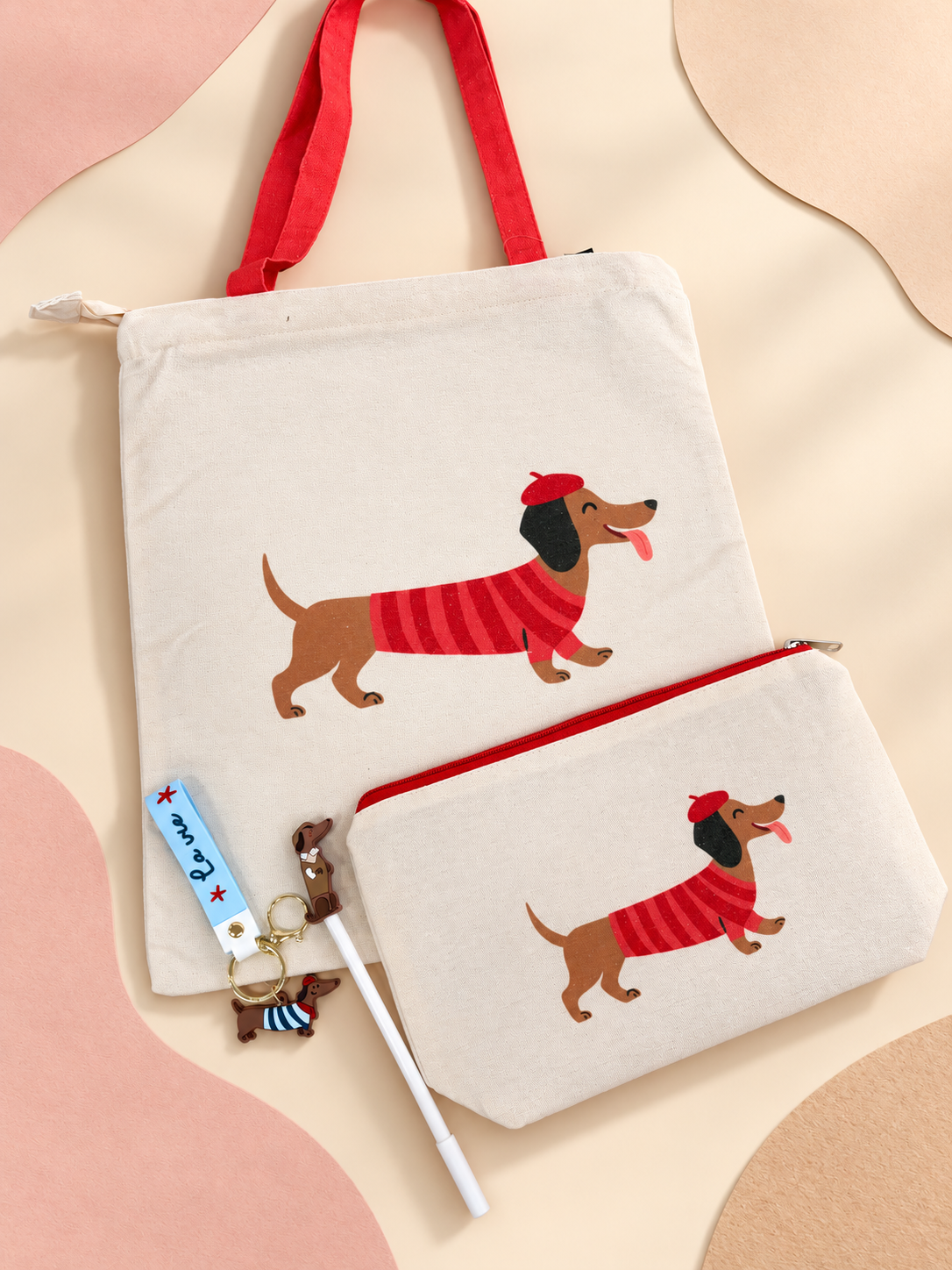 Pack teckel con boina · Llavero azul y boli blanco