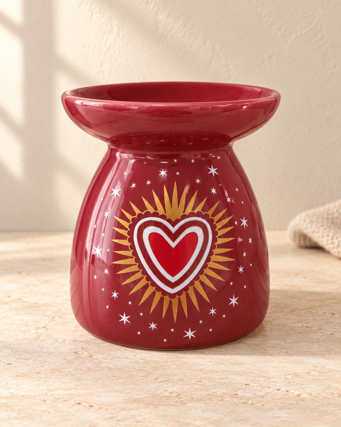 Quemador de wax melts · Corazón con destellos dorados