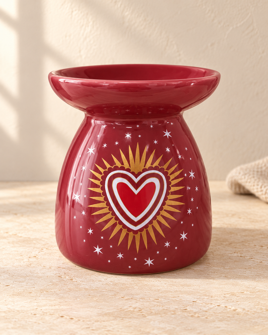 Quemador de wax melts · Corazón con destellos dorados